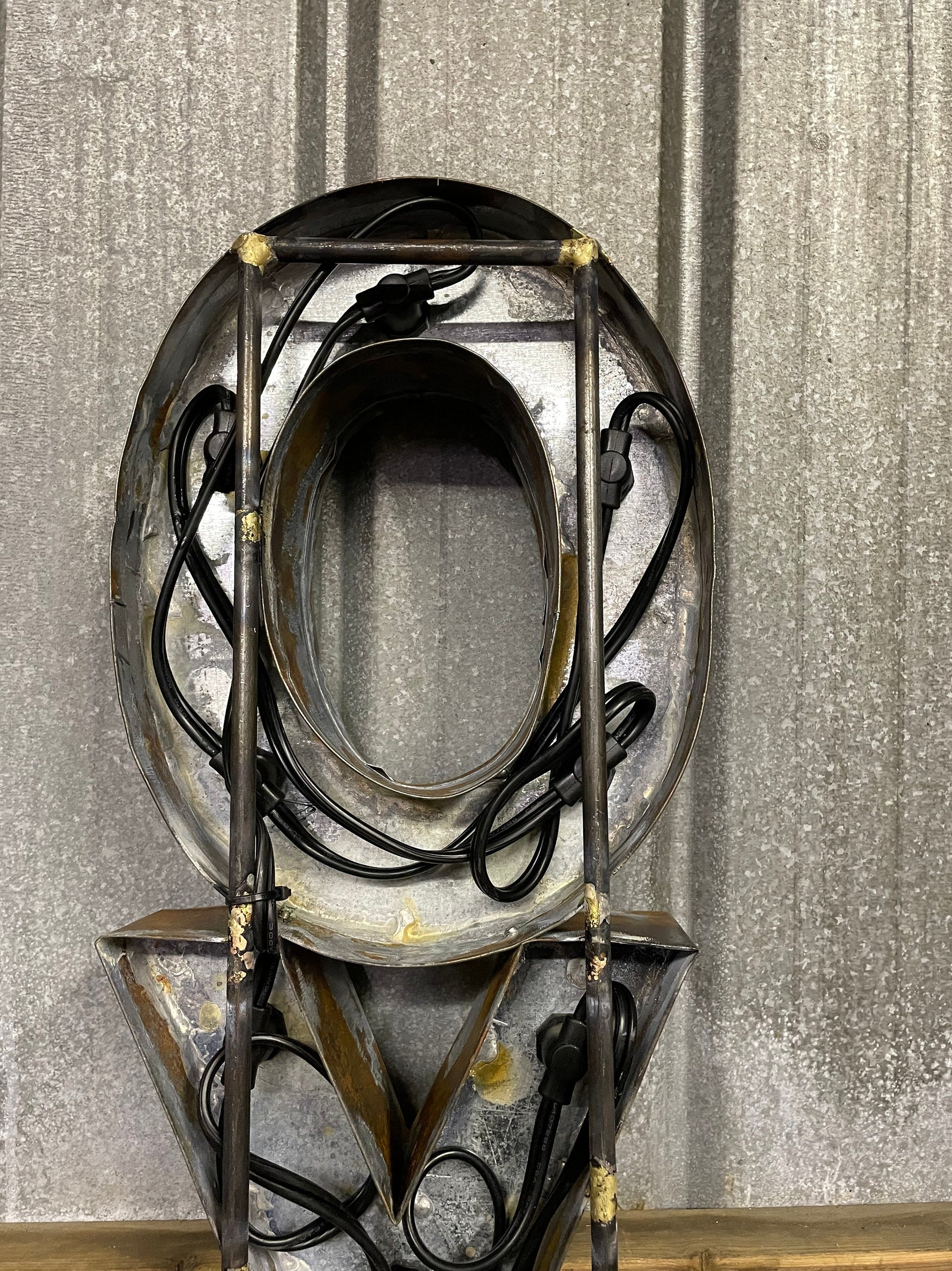 Image of 'O' letter in the word "Oysters" in a lit sign.